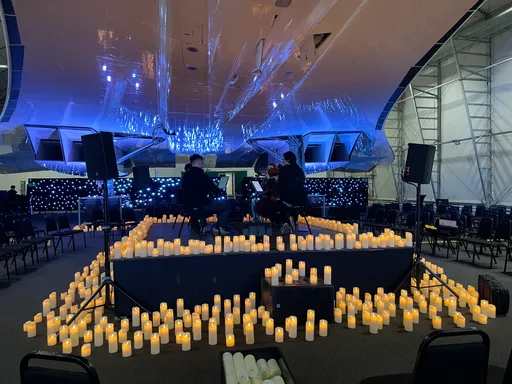 The stage-side setup for a Candelight concert at Concorde Manchester | [So Very Apt](https://sva.ltd)